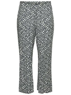 Pantalon blanc et bleu marine à motif tropical avec une coupe bootcut
