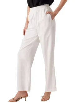 Pantalon blanc uni avec une coupe bootcut et une taille intermédiaire