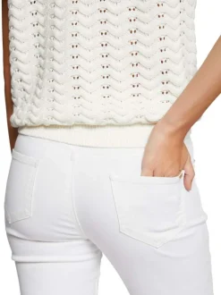 Pantalon blanc uni avec une coupe slim et une taille intermédiaire