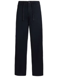 Pantalon bleu foncé à coupe droite pourvu d'un cordon de serrage à la taille