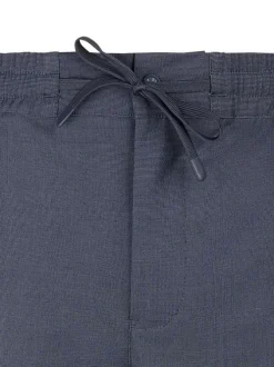 Pantalon bleu foncé à coupe droite pourvu d'une taille élastiquée