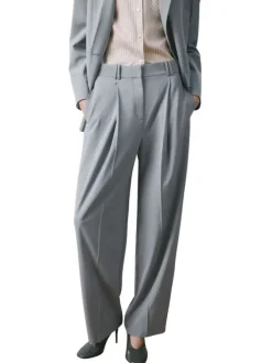 Pantalon bleu gris uni avec une coupe bootcut et une braguette zippée
