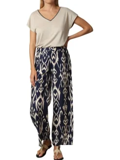 Pantalon bleu marine avec un imprimé géométrique et une coupe fluide