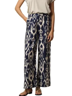 Pantalon bleu marine avec un imprimé géométrique et une coupe fluide