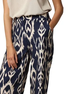 Pantalon bleu marine avec un imprimé géométrique et une coupe fluide