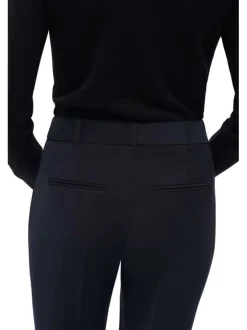 Pantalon bleu marine uni à coupe fuselée avec poches et fermeture zippée