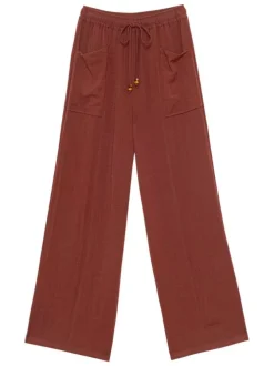 Pantalon bordeaux uni pourvu d'une coupe large et d'une taille élastiquée
