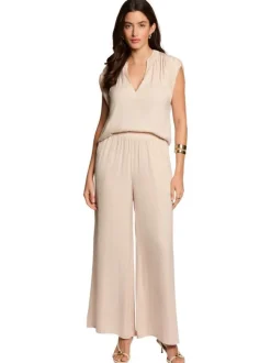 Pantalon chino beige clair uni avec une coupe large et de multiples poches