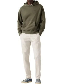 Pantalon chino beige à coupe slim pourvu du patch de la marque