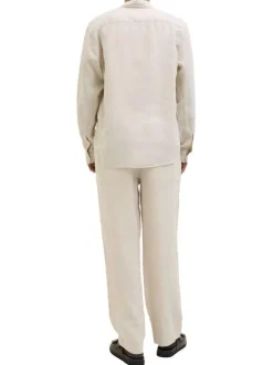 Pantalon chino beige en lin pourvu d'une taille élastiquée froncée