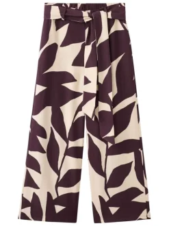 Pantalon chino beige à motifs pourvu d'une coupe large et d'une taille haute