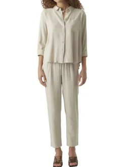 Pantalon Chino beige pourvu d'une coupe droite et d'une taille élastiquée