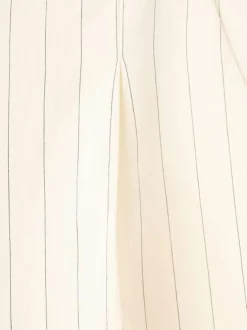 Pantalon chino beige à rayures pourvu d'une coupe bootcut et d'une taille haute