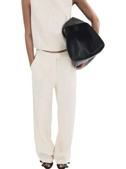 Pantalon chino beige à rayures pourvu d'une coupe bootcut et d'une taille haute