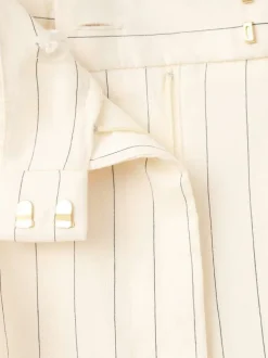 Pantalon chino beige à rayures pourvu d'une coupe bootcut et d'une taille haute