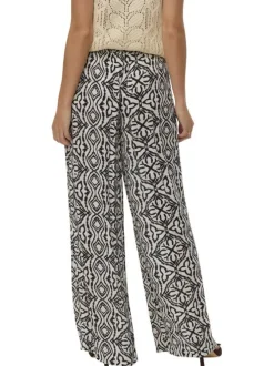 Pantalon Chino beige à taille élastiquée pourvu d'un motif abstrait
