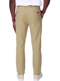 Pantalon chino beige uni avec une coupe ajustée à zip et à bouton