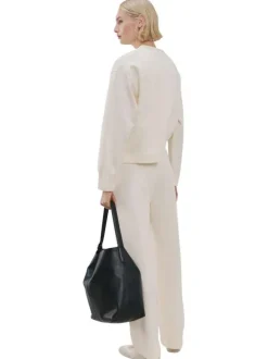 Pantalon chino beige uni avec une coupe droite et une taille élastiquée