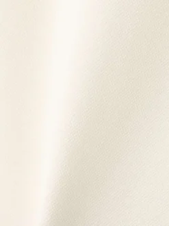 Pantalon chino beige uni avec une coupe droite et une taille élastiquée
