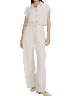 Pantalon chino beige uni avec une coupe flare et une taille élastiquée