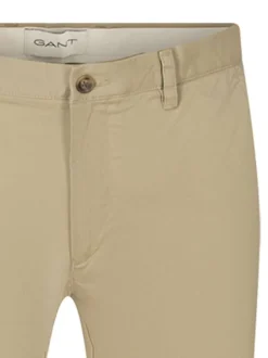 Pantalon chino beige uni en coton à coupe slim fit avec un zip et un bouton