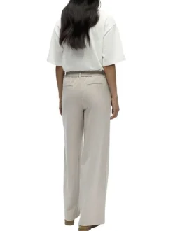 Pantalon chino beige uni pourvu d'une coupe bootcut et d'une taille haute
