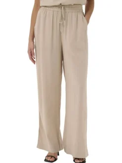 Pantalon chino beige uni pourvu d'une coupe bootcut et d'une taille haute