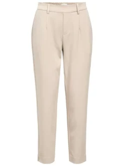 Pantalon chino beige uni pourvu d'une coupe slim et d'une taille intermédiaire