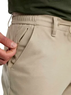 Pantalon chino beige uni pourvu d'un lien à nouer à la taille