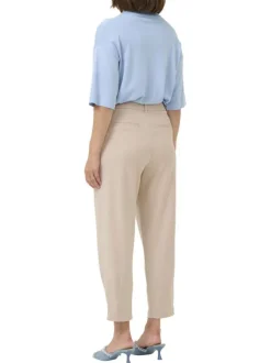 Pantalon chino beige uni taille haute pourvu d'une coupe ajustée