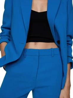 Pantalon Chino bleu uni avec une coupe bootcut et zippé boutonné à la taille