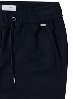 Pantalon chino bleu uni pourvu d'une coupe slim et d'une taille intermédiaire