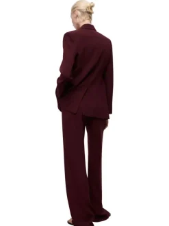 Pantalon chino bordeaux uni à coupe large et taille haute fermé par un zip