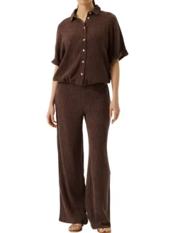 Pantalon chino brun uni pourvu d'une taille élastiquée et d'une coupe bootcut