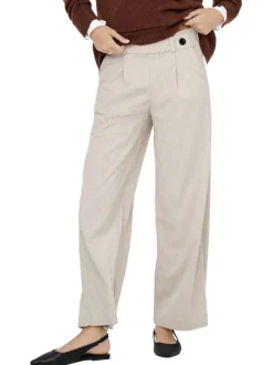 Pantalon chino écru à coupe ample en maille côtelée effet velours