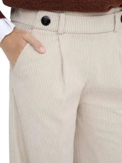 Pantalon chino écru à coupe ample en maille côtelée effet velours