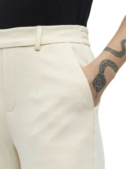 Pantalon chino écru uni pourvu d'une taille haute et d'une coupe bootcut
