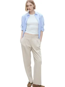Pantalon chino de couleur beige clair uni avec une coupe droite
