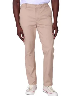 Pantalon chino en coton beige avec une coupe ajustée et une taille élastiquée