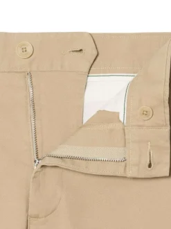 Pantalon chino en coton beige à coupe slim pourvu de poches plaquées