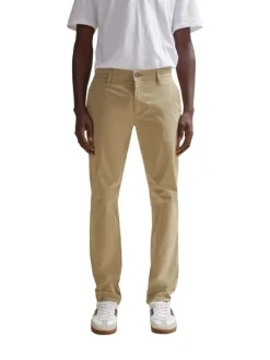 Pantalon Chino en coton beige uni avec une coupe slim et poches latérales