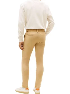 Pantalon Chino en coton beige uni avec une coupe slim à zip et à bouton