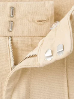 Pantalon chino en coton beige uni pourvu d'une coupe droite