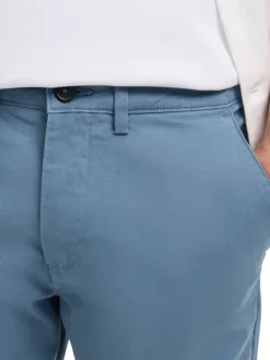 Pantalon Chino en coton biologique bleu uni avec une coupe slim