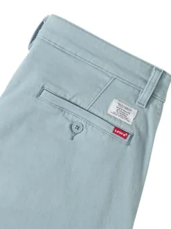 Pantalon chino en coton bleu clair pourvu du patch de la marque