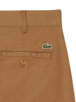 Pantalon chino en coton camel coupe slim pourvu de poches plaquées