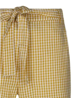 Pantalon chino en coton jaune imprimé pourvu d'une coupe large