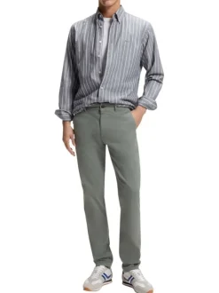 Pantalon chino en coton kaki à coupe slim pourvu d'une fermeture zippée