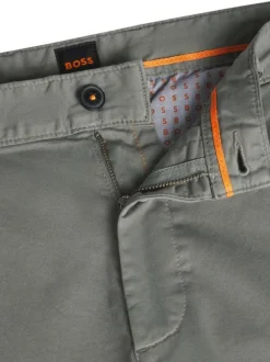 Pantalon chino en coton kaki à coupe slim pourvu d'une fermeture zippée