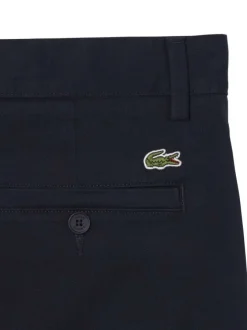 Pantalon chino en coton marine à coupe slim pourvu de poches plaquées